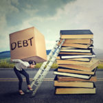 Student loan debt concept - Woman with heavy box debt carrying it up education ladder