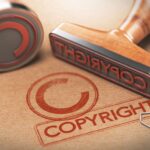 rubber stamps with copyright word and symbol over kraft paper background, Concept of copyrighted material